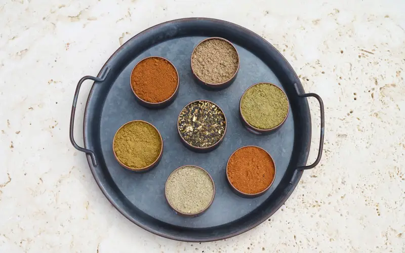 An aerial view of Zepice spices on a round tray 