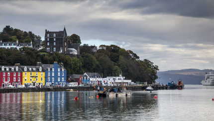 Pink yellow and blue houses on tobermory waterfront