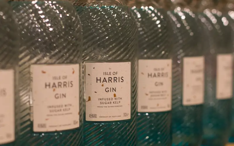 row of Harris gin bottles