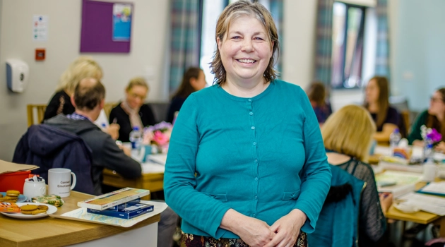 Kerrie Marshall Director Of Creativity In Care in blue jumper