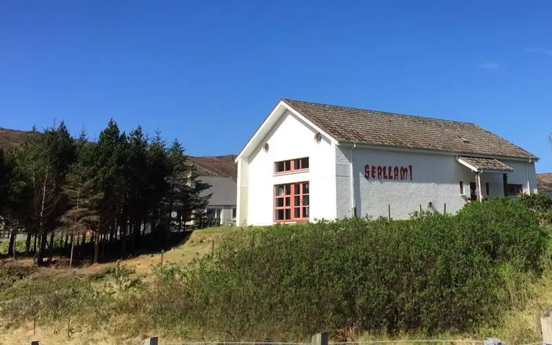Seallum Visitor Centre against a bright blue sky 